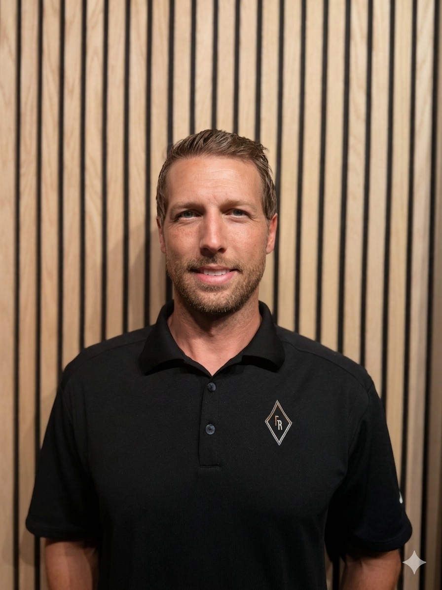 Landon Yokers, Owner of Frame Roofing Utah, in company polo