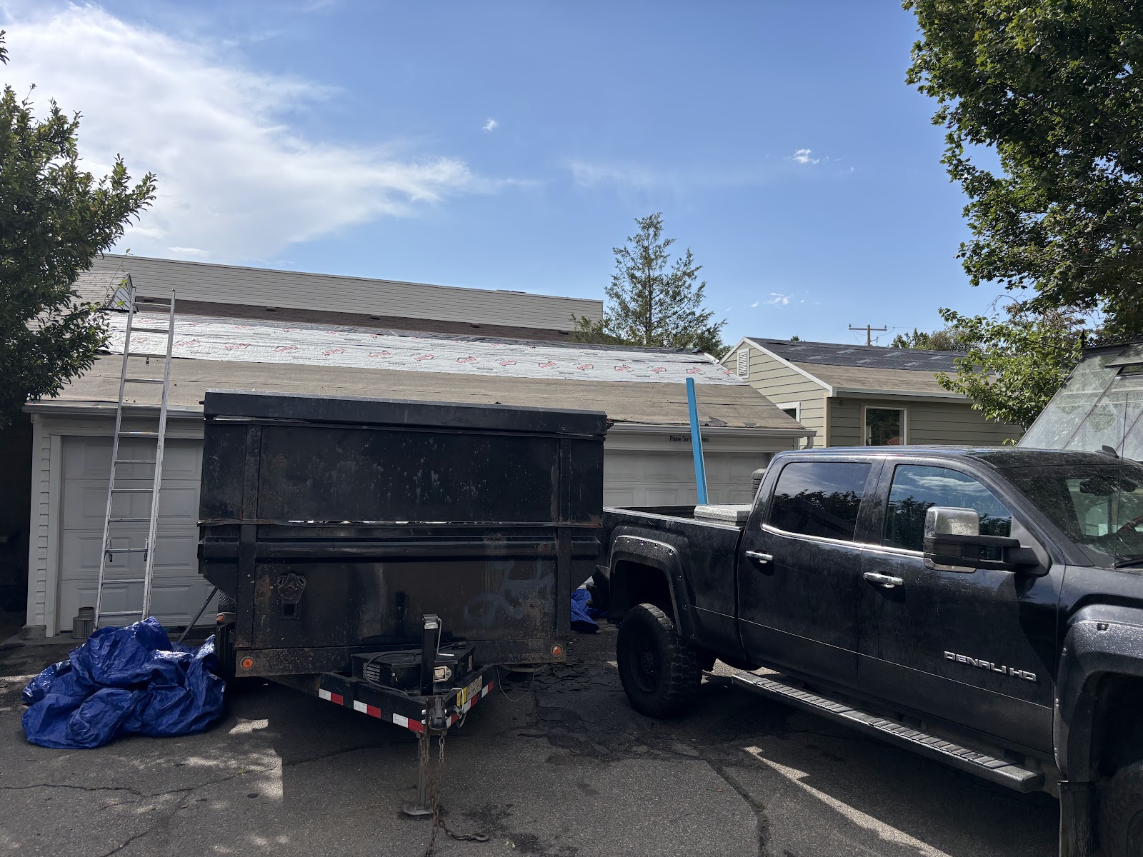 Frame Restoration job site with equipment ready for storm damage repair