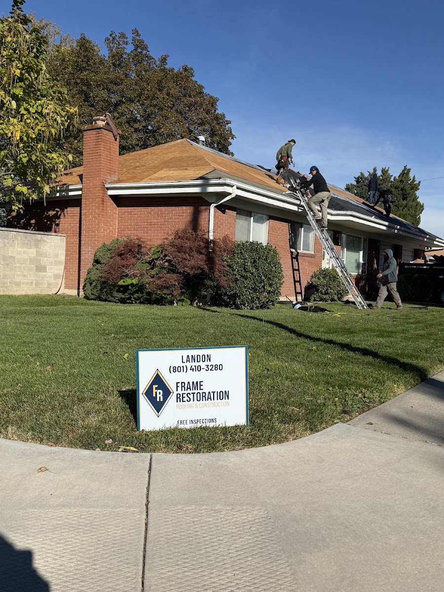 Frame Restoration crew working on insurance claim roof replacement