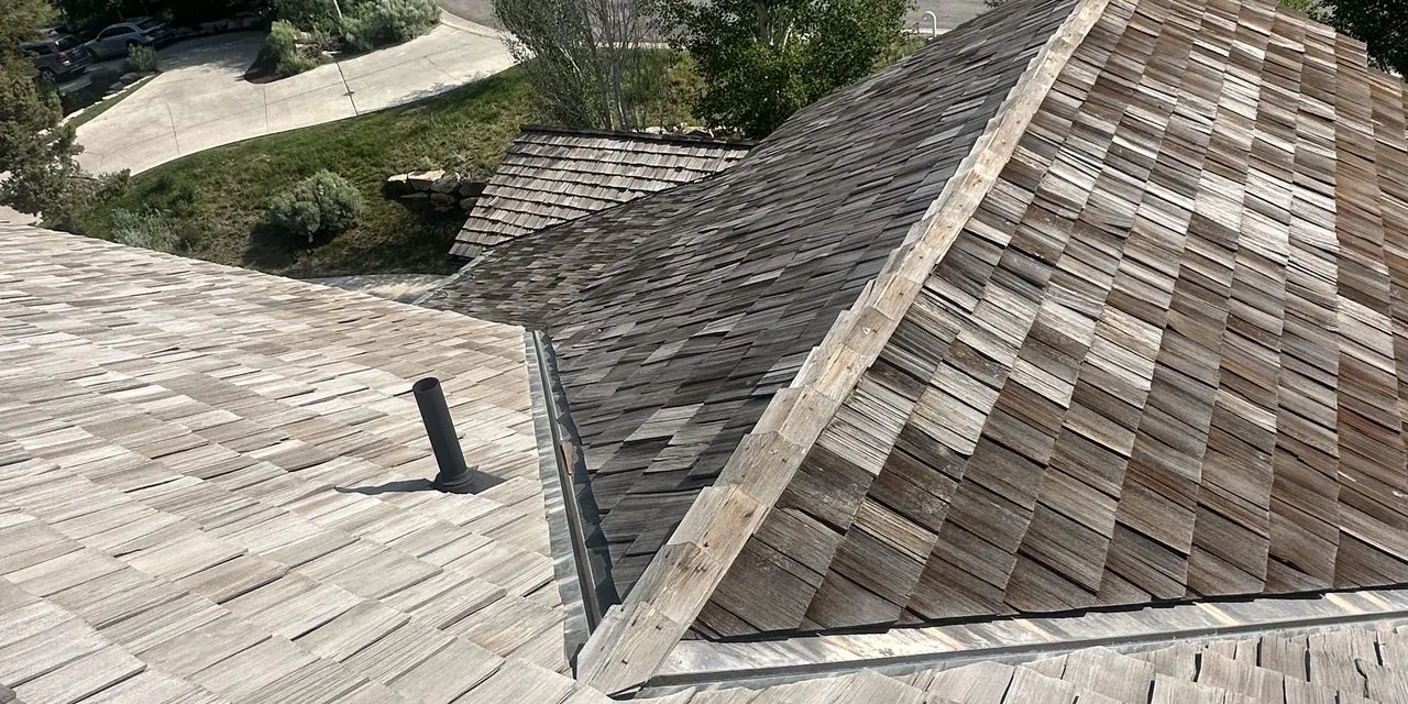 Professional roof replacement in progress on a Utah home