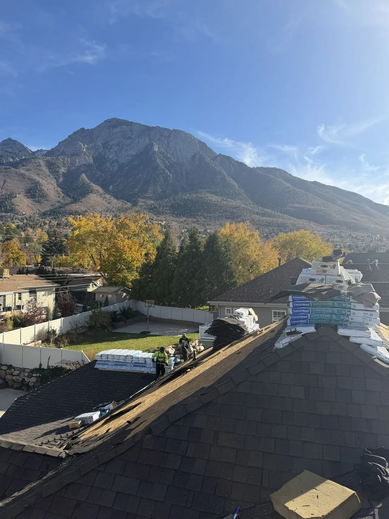 Riverton residential roof inspection after hailstorm - Frame Roofing Utah documenting shingle impact marks for insurance claim
