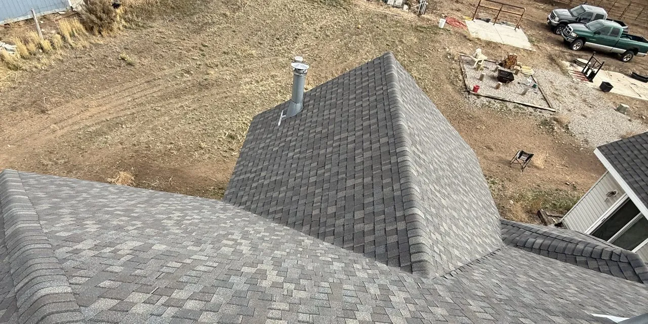 Utah residential home with completed roof replacement - premium architectural shingles installed by Frame Roofing Utah
