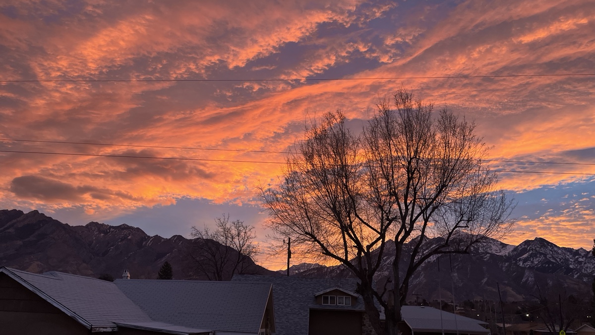 Cottonwood Heights Utah neighborhood rooftops below Mt. Olympus and the canyon mouths where Frame Roofing Utah responds to wind and hail storm damage