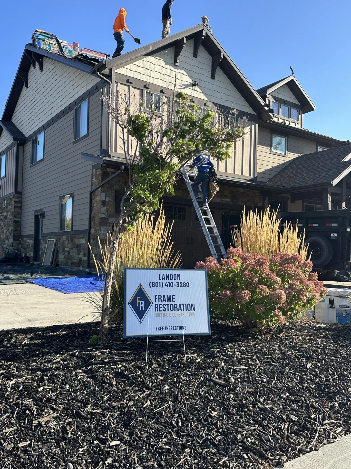 Heber City storm damage reroof with Frame Roofing yard sign — Frame Roofing Utah