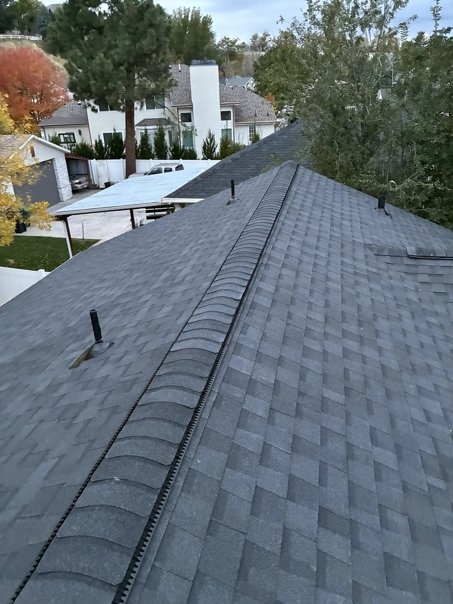 Storm damage roof restoration with clean ridgeline in Sandy, Utah — Frame Roofing Utah